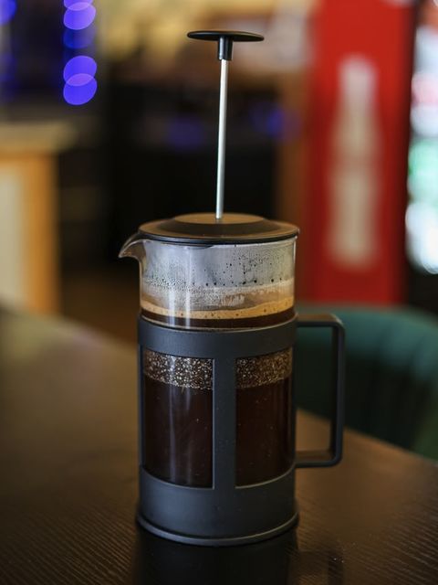 A French press of freshly brewed coffee